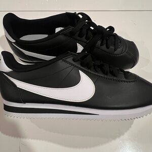 Size 10.5 women’s  - Nike Classic Cortez Black White 807471-010